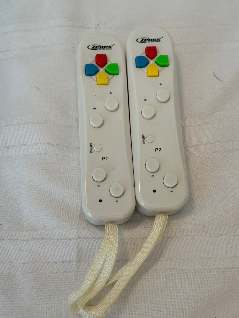 White Motion Game Controllers with Multicolor Buttons - Pair